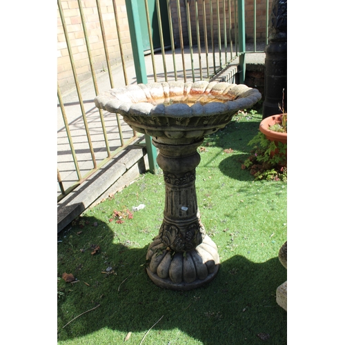 1007 - Reconstituted stone bird bath with floral and leaf design to plinth and fleur-de-lys design to top H... 