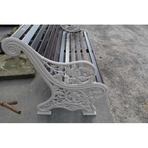 1025 - Ornate garden bench with cast ends with rose, thistle and leaf design teak slats with rolling back t... 