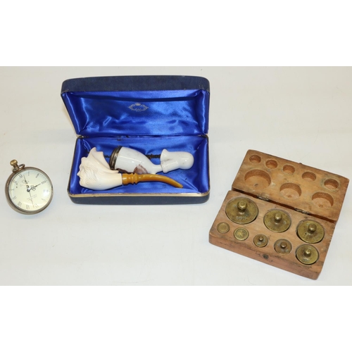 258 - Meerschaum pipe with amber mouth piece, two porcelain pipe bowl, brass ball clock and set of balance... 