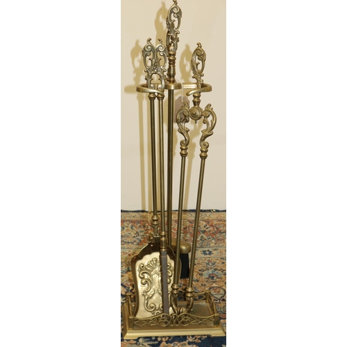 285 - Rococo style brass fireside companion stand with four implements, H76cm