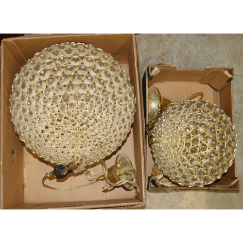 287 - Graduated pair of gilt metal and glass globular hanging light fittings, approx 40cm max (2)