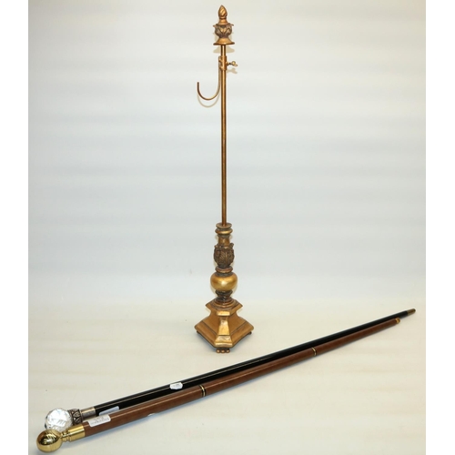 289 - Novelty sectional walking cane, brass handle with compass and glass tube, an ebonised walking cane w... 