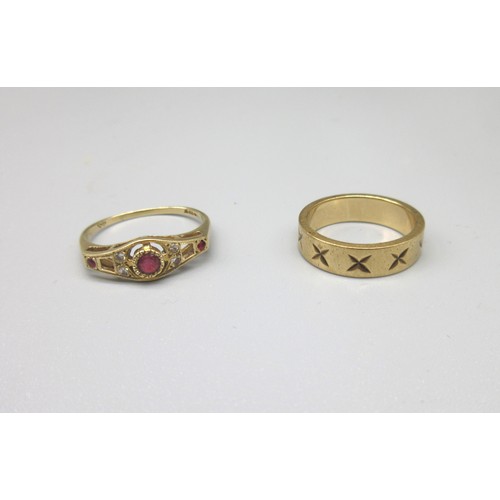 205 - 9ct yellow gold ring set with rubies and diamonds, size N, and a 9ct yellow gold band with engraved ... 