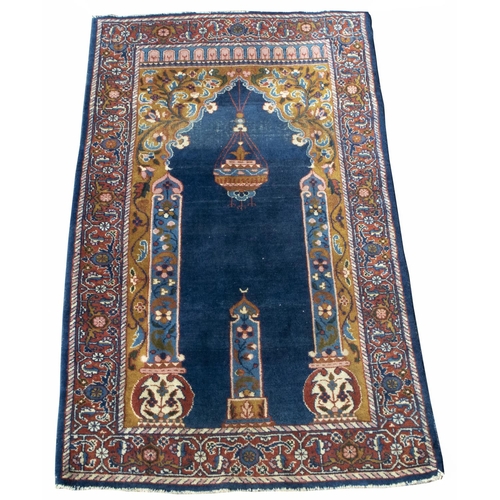 538 - Persian style multicoloured Prayer style rug, blue ground field with lantern enclosed by columns in ... 