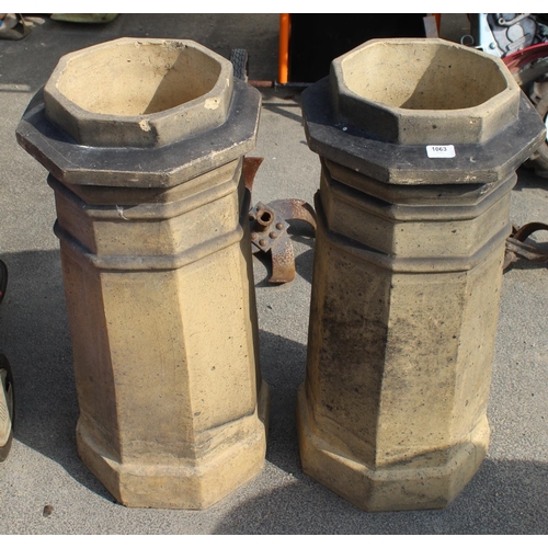 1063 - Pair of Dartfield Works Barnsley stone pot castle style chimney pots, H77cm D35cm