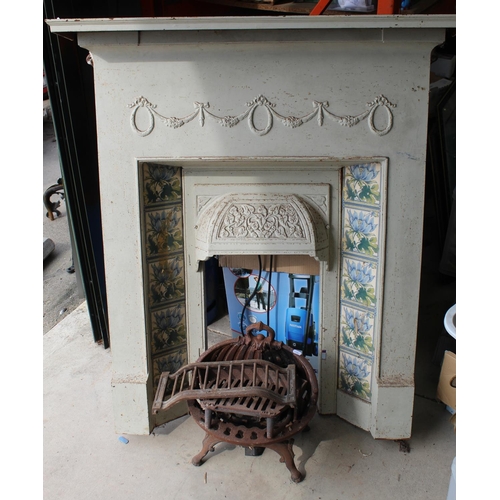 75 - The Amanda Barrie Collection - Victorian cast fire surround with swag and floral design tiles, and  ... 