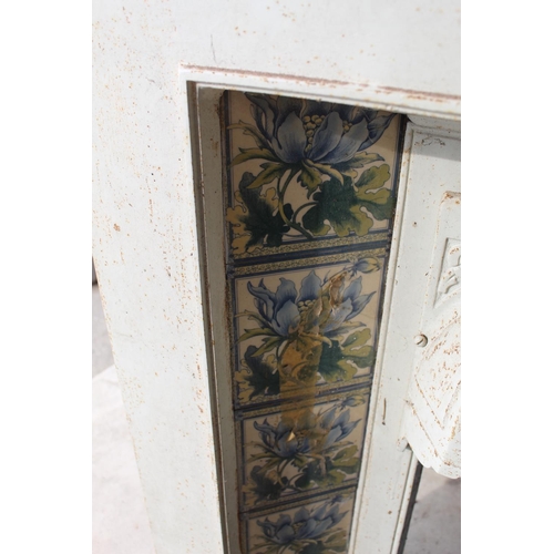 75 - The Amanda Barrie Collection - Victorian cast fire surround with swag and floral design tiles, and  ... 