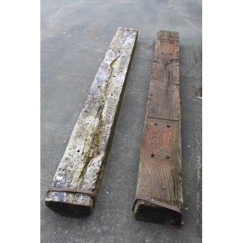 1143 - Pair of railway sleepers, 260cm x 26cm x 15cm