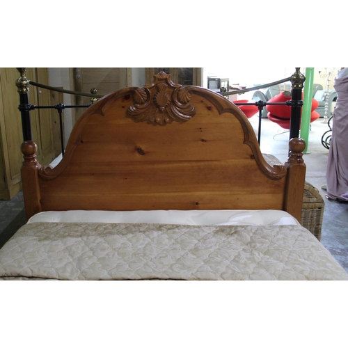 793 - Victorian style pine double bed, arched  headboard with carved cresting, base with four drawers, wit... 