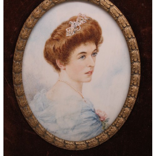 874 - The Lizzie Cundy collection - M. Moore early C20th oval bust portrait of a debutante in Moroccan lea... 