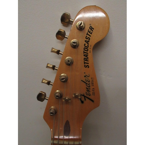 458 - Fender Stratocaster 6 string electric guitar, serial number CA10547, Fender strap and a Fox's Music ... 