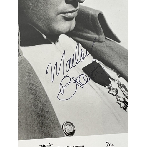 344 - Photo of Marlon Brando in 'Desiree', 20.5cm x 25.5cm,with signature, with Certificate of Authenticit... 