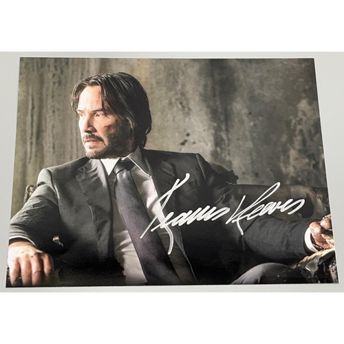 348 - Keanu Reeves 'John Wick' photo, 25.2cm x 20cm, with signature, with Certificate of Authenticity from... 