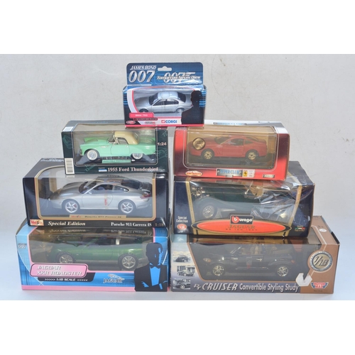 112 - Four boxed 1/18 diecast model cars to include Burago Jaguar SS100 (1937), James Bond Jaguar XKR Road... 