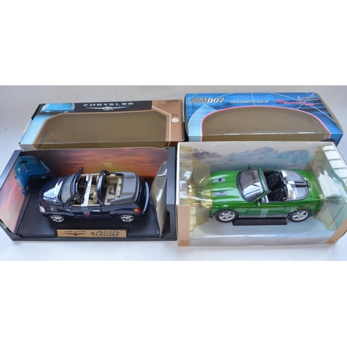 112 - Four boxed 1/18 diecast model cars to include Burago Jaguar SS100 (1937), James Bond Jaguar XKR Road... 