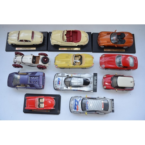 113 - Collection of 1/18 scale diecast model cars from Burago, Maisto, Ertl and Motor Max. Also included a... 