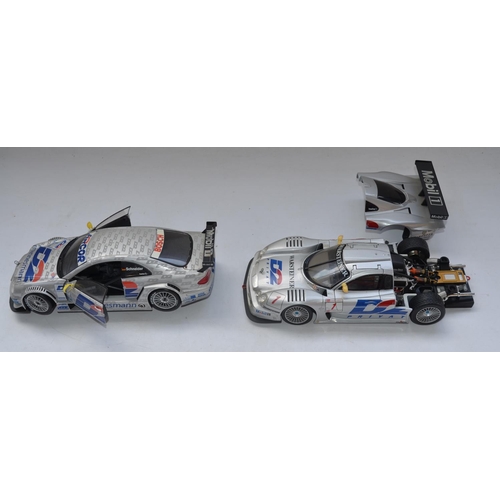 113 - Collection of 1/18 scale diecast model cars from Burago, Maisto, Ertl and Motor Max. Also included a... 