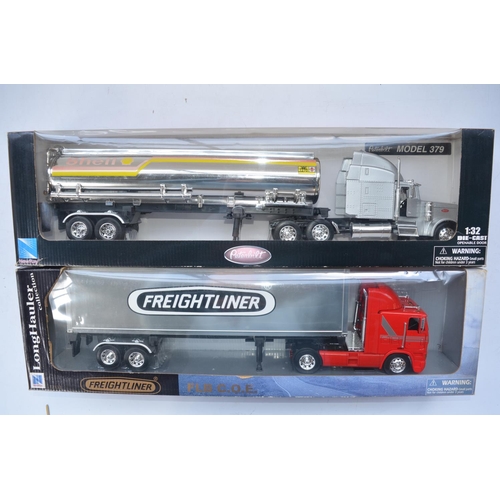 120 - Three boxed large 1/32 scale diecast and plastic truck models by New Ray, part of their Long Hauler ... 