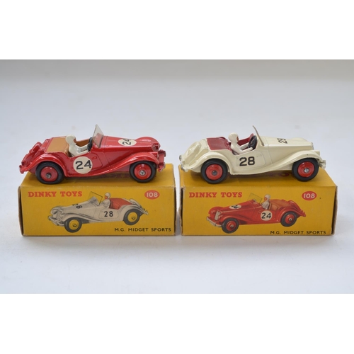 152 - Two vintage Dinky Toys MG Midget Sportscar models, one white 