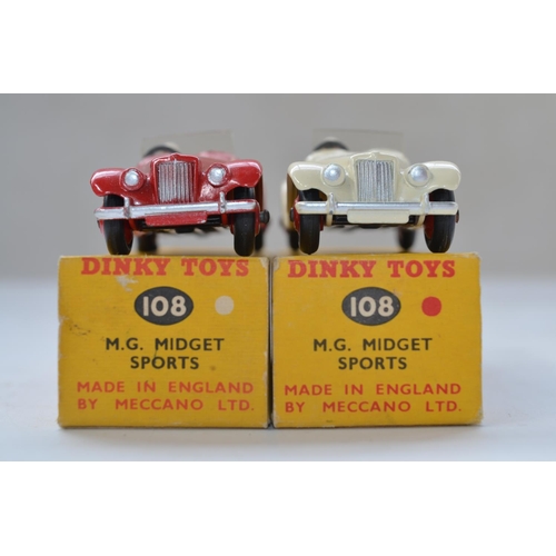 152 - Two vintage Dinky Toys MG Midget Sportscar models, one white 