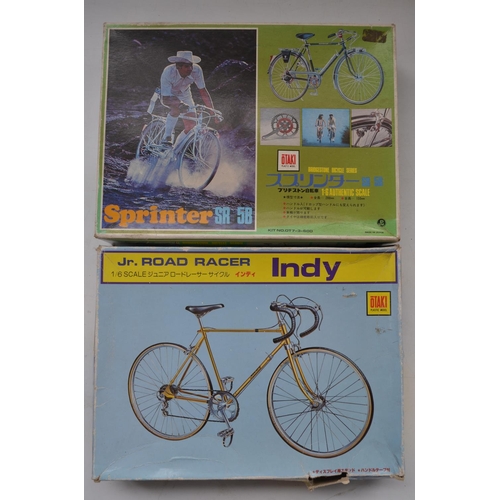 209 - Two 1/6 scale racing bicycle models from Otaki to include Indy Jr Road Racer (one bag split open but... 