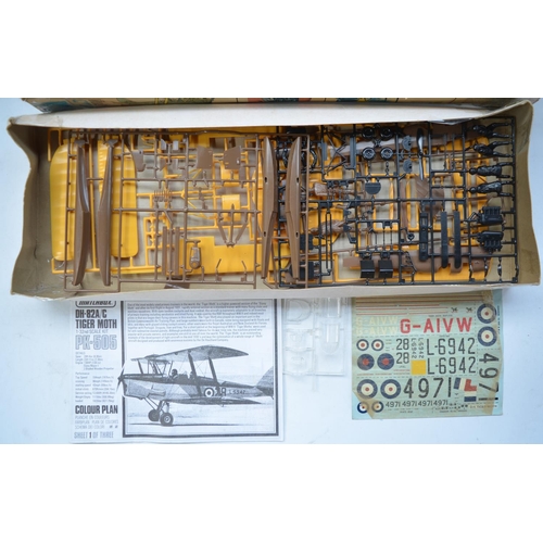 217 - Three unstarted 1/32 plastic model kits to include Matchbox Lysander and Tiger Moth (some parts loos... 