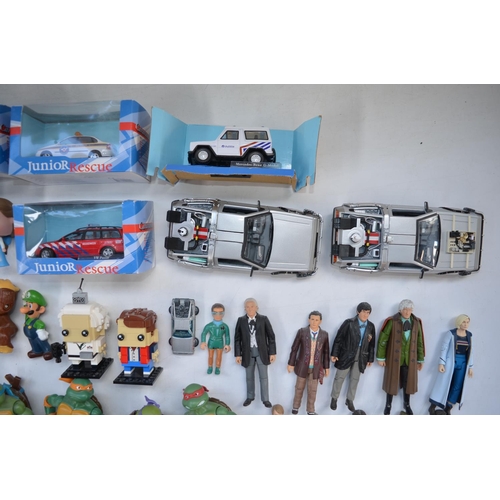 240 - Collection of unboxed action figure toys and other TV related toys to include 2x Welly Back To The F... 