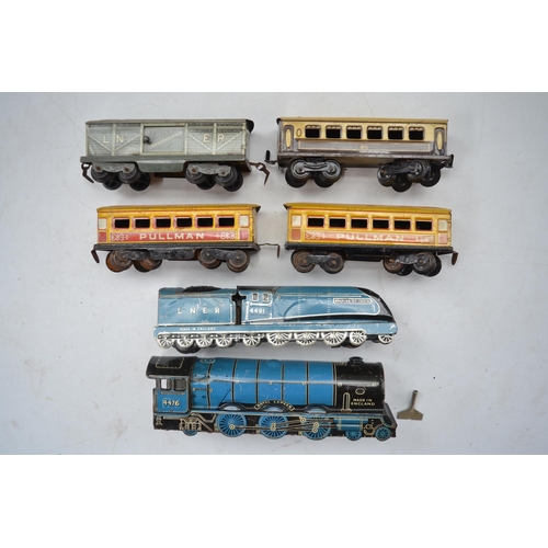 249 - Vintage tinplate clockwork Royal Lancer and Empire Of India floor train models with 4 wagons/coaches... 