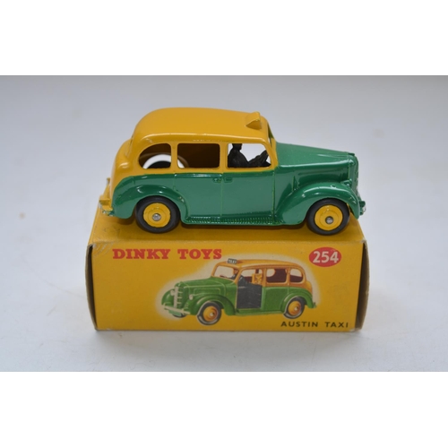 156 - Vintage Dinky Toys Austin Taxi (no 254) with original box, model in excellent condition for age, som... 