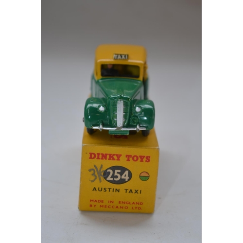 156 - Vintage Dinky Toys Austin Taxi (no 254) with original box, model in excellent condition for age, som... 