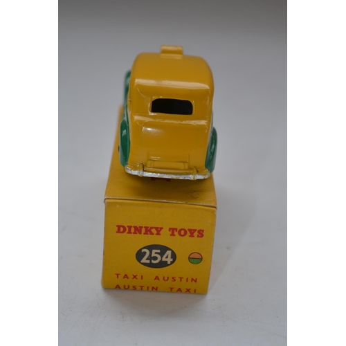 156 - Vintage Dinky Toys Austin Taxi (no 254) with original box, model in excellent condition for age, som... 