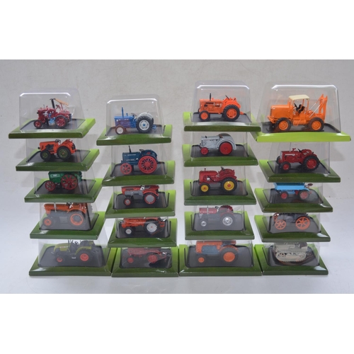 181 - Twenty diecast small scale model tractors/agricultural machinery by Hachette Partworks and 3x Atlas ... 