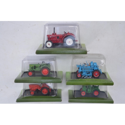 183 - Twenty Five diecast small scale model tractors/agricultural machinery by Hachette Partworks