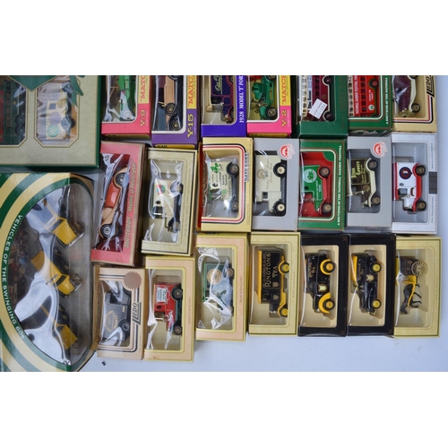 184 - Collection of boxed diecast vehicles from Matchbox and Lledo including Rington's Tea models. Qty