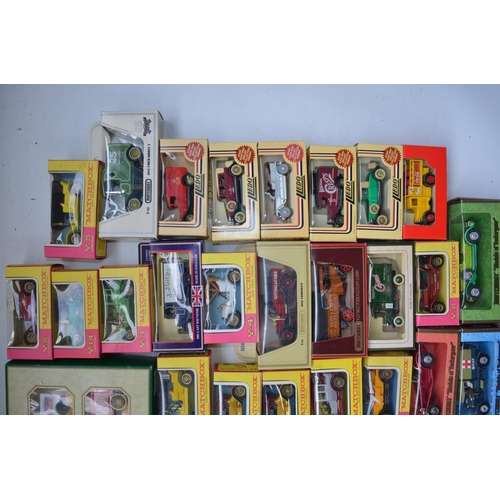 184 - Collection of boxed diecast vehicles from Matchbox and Lledo including Rington's Tea models. Qty