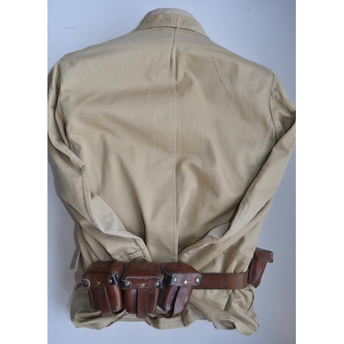 905 - German Afrika Korps jacket by Marquarot & Schulz, cap, leather belt and ammunition pouches. Complete... 