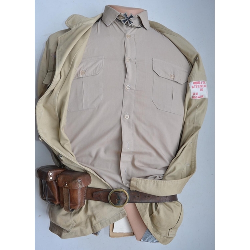 905 - German Afrika Korps jacket by Marquarot & Schulz, cap, leather belt and ammunition pouches. Complete... 