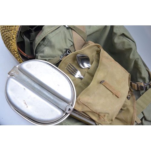 907 - WW2 era US infantry jacket (no size present) with Helmet, bayonet, mess kit and canteen, webbing, ba... 