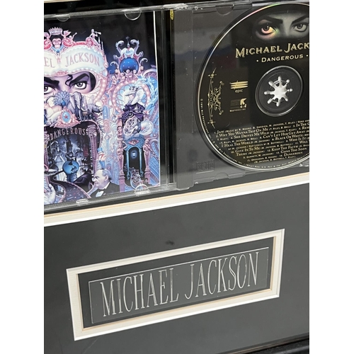 476 - Michael Jackson framed 'Dangerous' CD and signed photo of Michael Jackson, 45.4cm x 69.8cm, with Cer... 