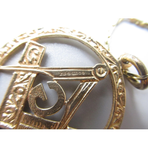 739 - 9ct yellow gold Masonic Square & Compass pendant, stamped 375, on yellow metal chain, L76cm approx.,... 