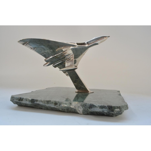 924 - Silver plated solid metal Avro Vulcan model on stylised stand with marble base, no makers marks. Win... 