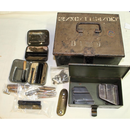 899 - Military tin containing a collection of WWII items including gun cleaning kits, inert training bulle... 