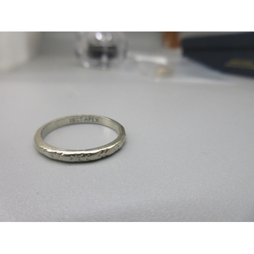 14 - 18ct yellow gold plain wedding band, size L1/2, and a 18ct white gold wedding band with etched desig... 