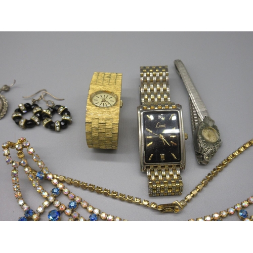 48 - Collection of costume jewellery including brooches, earrings, watches etc.