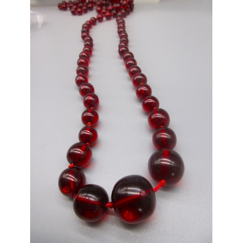 5 - Set of graduated cherry red Bakelite beads, double knotted, 75.3g, largest W2cm