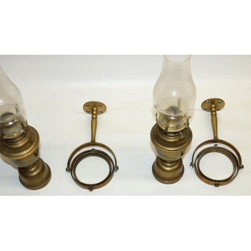 271 - Pair of brass ship's lanterns, wall mounted gimbal brackets, glass shades, H38cm inc. shade