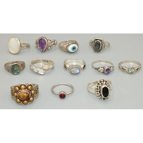 308 - Group of late C20th silver rings stamped SILVER or 925, the majority set with semi-precious stones (... 