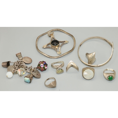 346 - Late C20th modernist silver jewellery including a men's bark effect ring, other rings, bangles, and ... 