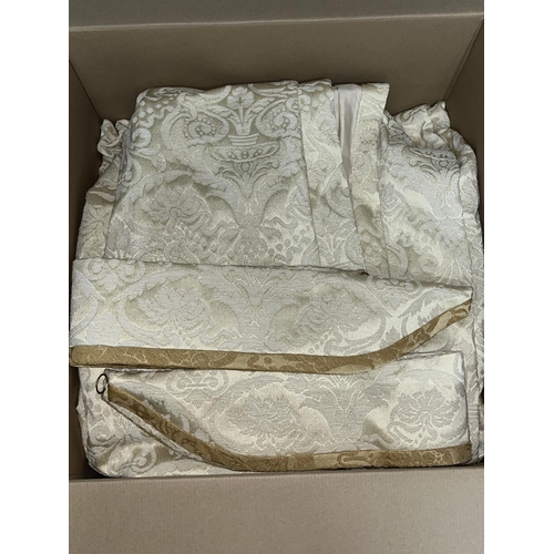 353 - Pair of light gold/cream damask curtains, approx. 240cm drop, lined, with tiebacks, nets and pelmets... 