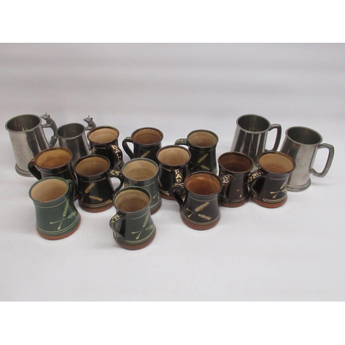 332 - 12 studio pottery mugs, with words to handle and 4 pewter tankards, 2 in relation to the Sinnington ... 